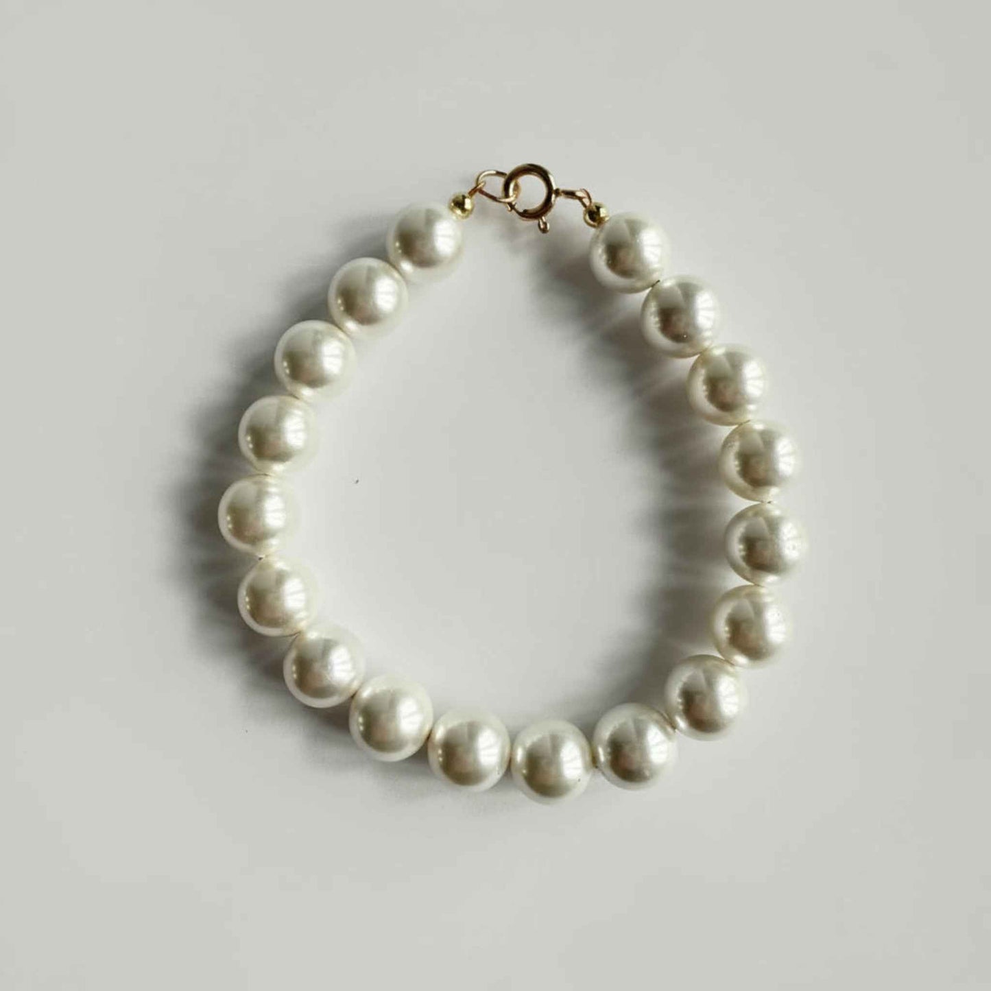 Armband van schelpparels met gold filled slot