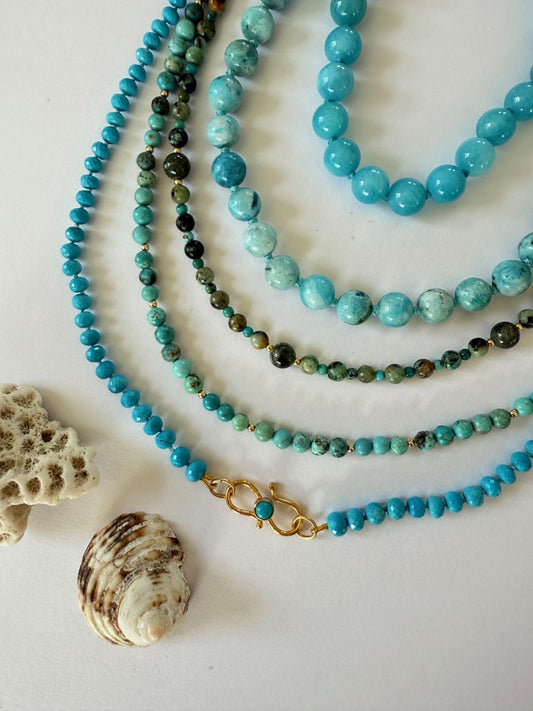 Ketting van turkoois facetkralen en vermeil siersluiting