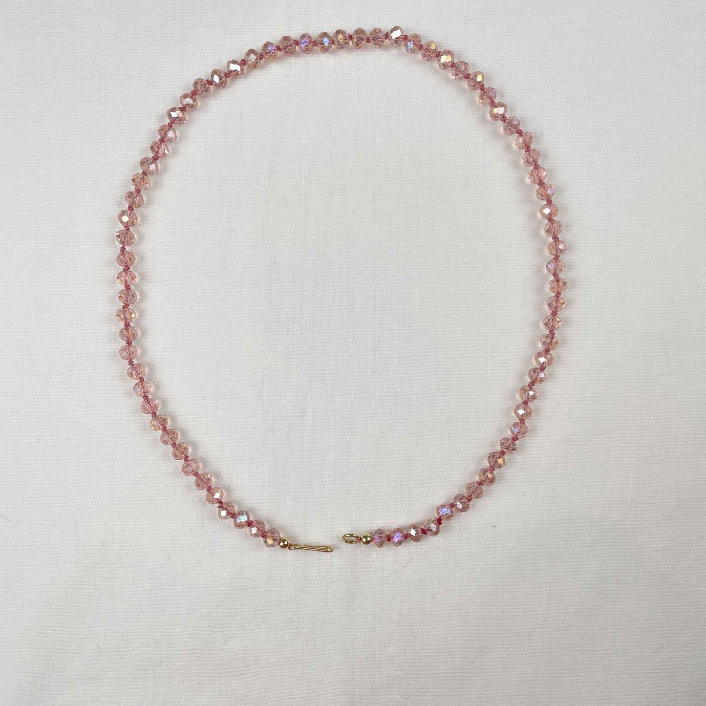 Ketting van roze kristal rondellen met gold filled haaksluiting
