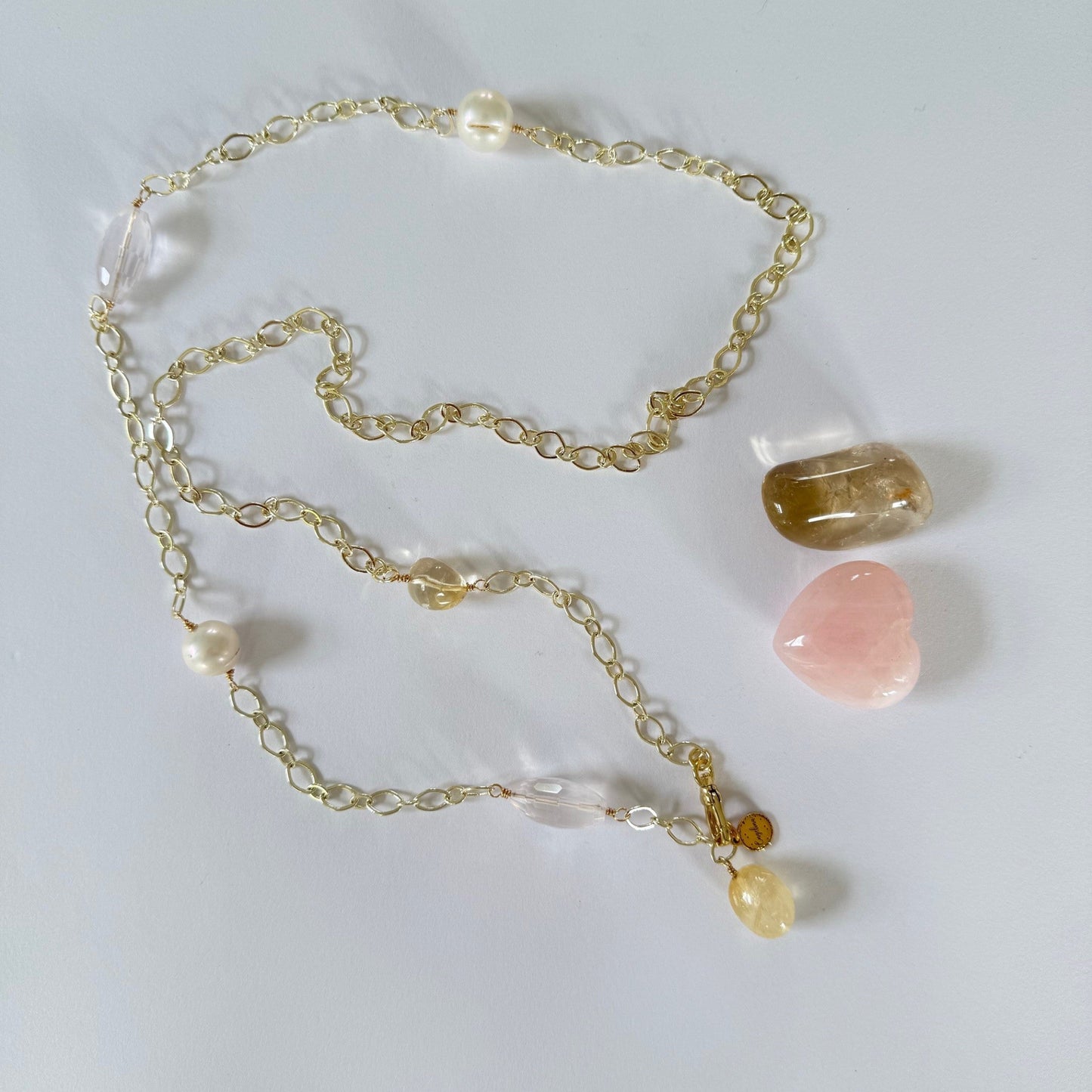 Lange verstelbare schakelketting met citrien en rozenkwarts