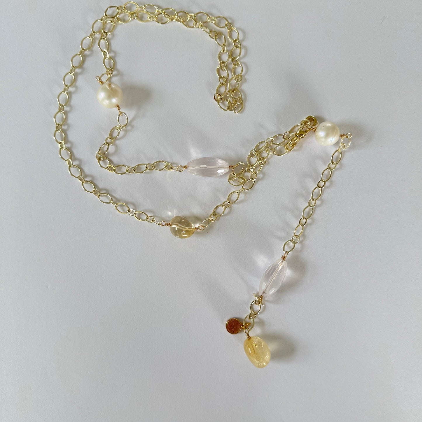 Lange verstelbare schakelketting met citrien en rozenkwarts