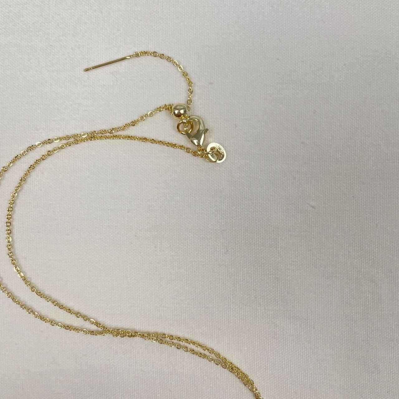 Gold filled schakelkettinkje met bol bedel hartje