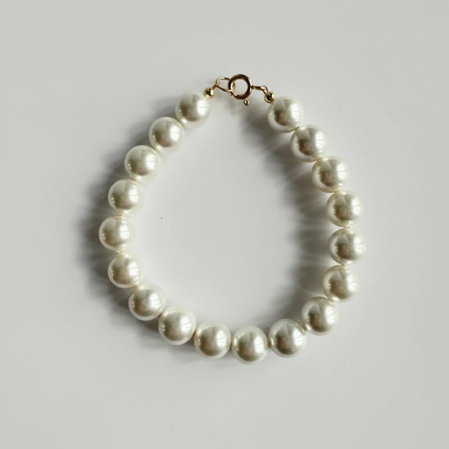 Armband van schelpparels met gold filled slot