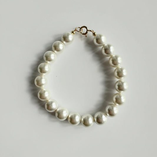 Armband van schelpparels met gold filled slot