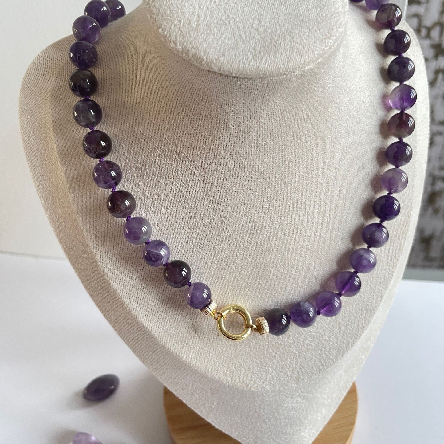 Korte ketting van amethist kralen met open einden