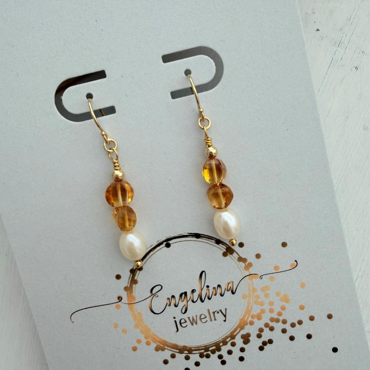 Gold filled oorbellen met citrien en zoetwaterparel