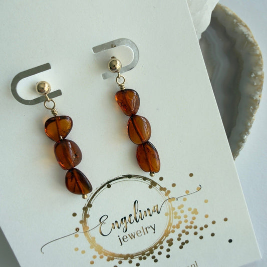 Gold filled oorknopjes met barnsteen