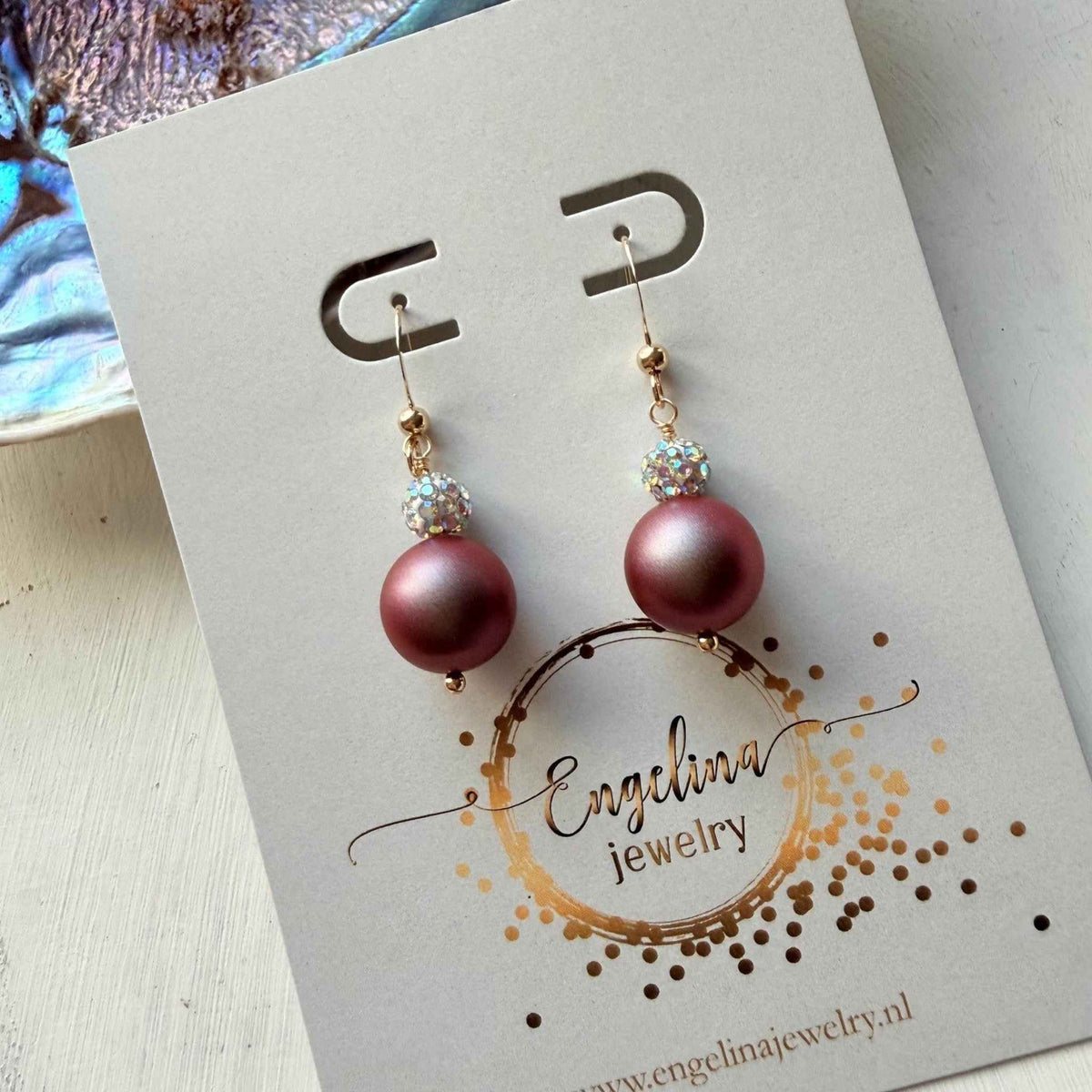 Gold filled oorbellen met Swarovski parel in paars