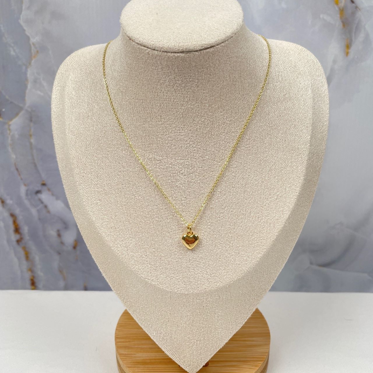 Goldfilled schakelkettinkje met bol bedel hartje