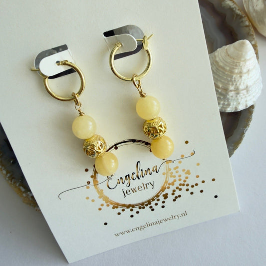 Gold filled oorbellen van gele calciet met opengewerkte gold filled kraal